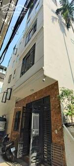 Bán nhà riêng 6 tầng Hoàng Đạo Thành, 30m2, mặt tiền 5,2m, ngõ ô tô đỗ cửa, thang máy