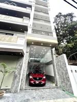 CỰC HIẾM! Siêu Phẩm Nguyễn Đức Cảnh – 98m² x 7T – Gara 2 Ô Tô – Thang Máy – Gần Hồ Đền Lừ