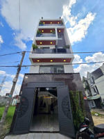 bán nhà mới đường tân chánh hiệp 18. dt : 5m x 15m , lửng 3 lầu có 5pn đường xe hơi 6m giá 7.6 tỷ