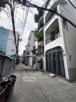 nhà mới, trệt,3 lầu, hẻm xe hơi trục thằng, nhà căn góc, cách mặt tiền, không tới, 100m.