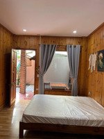 bán 394m2 trần hưng đạo, có 12 bung doanh thu 40tr/tháng, sổ có 203m2 đất ở, đi bộ ra biển được