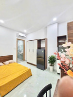 phòng studio full nội thất, thoáng mát. toà nhà thang máy, hầm xe. ngay cầu bông, quận 1