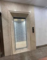 tôi cho thuê nhà hai mặt tiền,mới, thang máy, vỉa hè, 105m2- 4t, ngay giáp thái hà, chùa bộc_34 tr