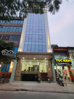 cho thuê nhà mặt phố vũ phạm hàm. dt : 150 m* 6 tầng .mt : 6 m . thông sàn, thang máy