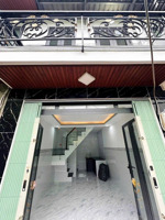 tôi bán nhà sd 39 m2, 1 trệt, 1 lầu, sổ hồng, tuyệt đẹp, quận 7. giá: 1,55 tỷ