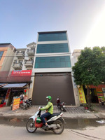 cho thuê nhà mặt phố đỗ nhuận, btl dt 100m, 4 tầng 1 tum, 1 hầm. mt 6m, thông sàn, thang máy giá 58