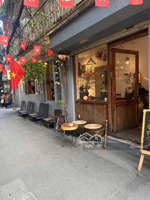nhà có cửa hàng 110m2 phố nguyên hồng sổ đỏ ba đình tầng 1 quán cafe đông khách lô góc , ô tô đỗ .