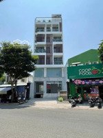 bán tòa nhà văn phòng 9m x 30m. 1 hầm 7 tầng thang máy mặt tiền trần thị cờ