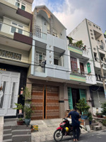 nhà mới 3 lầu mặt tiền đường 10m, bình phú, giá tốt