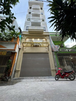 nhà khu phân lô cán bộ- dt 90m2- xây 7 tầng thang máy- đẹp long lanh- về ở luôn