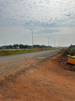 đất nền sổ hồng riêng mặt tiền đường song hành cao tốc. 108m2 thổ cư 98m2. cách sân bay 2km