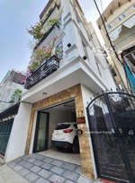 nhà phố hoàng hoa thám - lô góc - ô tô vào nhà - 5 tầng thang máy - full nội thất ở ngay