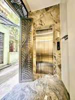 hiếm -nhà lô góc - thang máy - dt 49m x 5t - mặt ngõ to kinh doanh - ô tô đỗ cửa