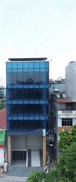 bán toà văn phòng mặt phố 180m2 xây 9 tầng trung tâm hoàng mai, nhà mới, lô góc, vỉa hè rộng