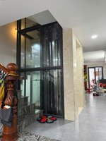 nhà 5 tầng + thang máy đường nhựa 10m . dt : 4.1 x 22m . dtcn 87m2 giá : 12.52 tỷ