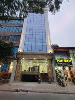 cho thuê mặt phố nguyễn khang . dt : 145m * 6 tầng + 1 hầm.mt : 10m , thông sàn, thang máy, nhà mới