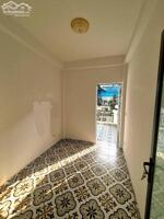 Căn nhà nhỏ nhưng có ban công tràn nắng ở Tôn Thất Tùng đối diện Bệnh viện Đại học Y 32m 5 tầng giá 7.15 tỷ.