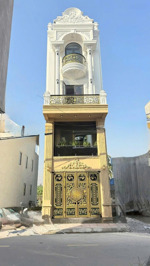 nhà 4 tầng thang máy mặt đường quỳnh hoàng nam sơn