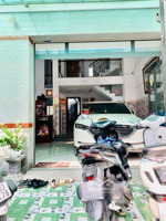 bán nhà mặt tiền 4 tầng - gần chợ - nhà mới ở ngay - thích hợp cho thuê vp - 100m2 - 10.x tỷ