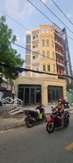 siêu phẩm!góc 2mt kd đỉnh-ngay emart-sát sân bay ga t3-mới 100%-6tầng-sang-xịn-thang máy 