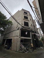 cần bán nhà gara ô tô lạc long quân 6 tầng, diện tích 58m2, có thang máy và thông ra võ chí công