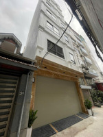 bán nhà sát phố 2 mặt ngõ 21 tỷ 50m 6 tầng mt 4,7m gara ô tô 7 chỗ nguyễn khánh toàn cầu giấy