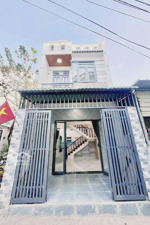 nhà 2 tầng mới đẹp hẻm xe hơi 5m thông khu dân cư hiện hữu sổ hồng riêng, ngay chợ trần thị cờ q12