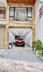 nhà dân xây phố trạm 45m x 7 tầng thang máy - lô góc 3 mặt thoáng - gara ô tô - ngõ thông tứ tung