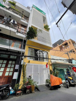 bán nhà 5 tầng, hxh 489 huỳnh văn bánh, p13, phú nhuận.dt:4,5x14, giá:15,5 tỷ