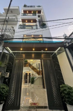 siêu phẩm chân dài - thiết kế tỉ mỉ- lâm thị hố -q12- 56m2- 5 tầng- full nội thất- gara ô tô