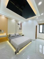 bán nhà mới thạnh xuân 25, q12 1 trệt lửng 3 lầu, có thang máy, gara ô tô, full nội thất