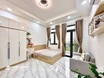 căn hộ studio ban công full nội thất cao cấp cách mạng tháng tám ,quận 10 ( gần vòng xoay dân chủ)