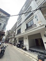 mặt phố đội nhân, ba đình -40m - mặt tiền 4,5m -7 tầng thang máy lô góc vỉa hè , ô tô tránh, kd