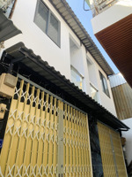 tôi bán nhà 60 m2 sd, 1 trệt, 1 lầu, tuyệt đẹp, quận 7, giá: 1,65 tỷ