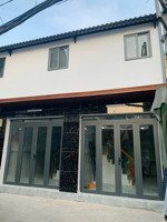 tôi bán nhà 38 m2 sd, 1 trệt, 1 lầu, xe hơi đậu trước nhà, tuyệt đẹp, quận 7, giá: 1,55 tỷ