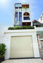 siêu phẩm 4 tầng đẹp lung linh thang máy tăng full noi that đường xe hơi đường số view kênh đào