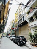 hơn 30 tỷ nhà khó tìm 77m2 9 tầng thang máy thông sàn, gara ô tô có hầm ngõ thông, thiện trí bán