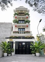 nhà phố mới sổ hồng riêng, 4pn, 1 triệt 2 lầu & sân thượng, sát phú mỹ hưng quận 7.