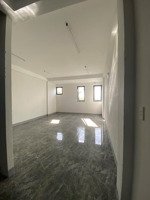 cho thuê nhà 4 tầng mt mỹ an gần cầu trần thị lý! ngũ hành sơn. dt 100m2 x 4 tầng trống suốt