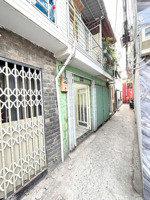 bán nhà 2 lầu sổ hồng riêng - quận 7