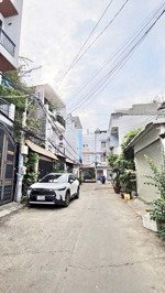 nhà 4 tầng đường nhựa 5m xe hơi tới cửa - 4*14-56mv - nhỉnh 5t tl - huỳnh tấn phát