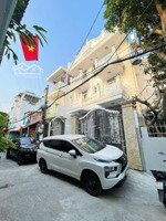 * bán nhà nơ trang long, bình thạnh. ngang 8.5m dt 165m2 hầm + 4 tầng + thang máy + 20 phòng....