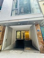 cho thuê nhà ngõ 12 đỗ quang,cầu giấy,55m * 6 tầng 1 hầm,thông sàn,giá 35 triệu,lh 