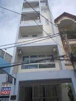 toà nhà 7 tầng đường phổ quang (5mx24m. nở hậu 6,5m). giá 29 tỷ