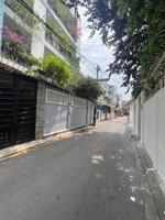 hẻm oto vf3 khu phan xích long 5 tầng nhà còn mới 4pn sát mặt tiền