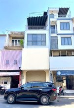 mặt tiền kd lê văn sỹ, quận 3 dt: 4x17m hầm 4 lầu thang máy
