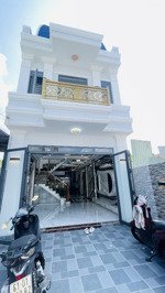 đông hoà- dĩ an nhà mới trệt lầu 110mv - ngang 5-sân xe hơi - đường 6m