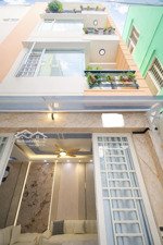 nhà 3 mặt thoáng phú nhuận, 50m2, nhà mới, 4 tầng 5 pn, sân để xe rộng rãi, hơn 8 tỷ