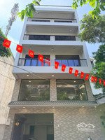 tòa nhà mới xây đường rộng 8m-- gần chợ căn cứ__diện tích:7x15m - 5 lầu sàn suốt (có thang máy)