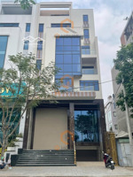 tòa nhà mặt tiền view sông đường trần qúy kiên 10*24m, hầm, 7 tầng suốt, thang máy, 330 triệu/tháng